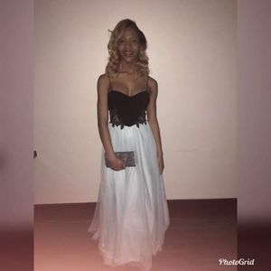 A prom light blue dress black top